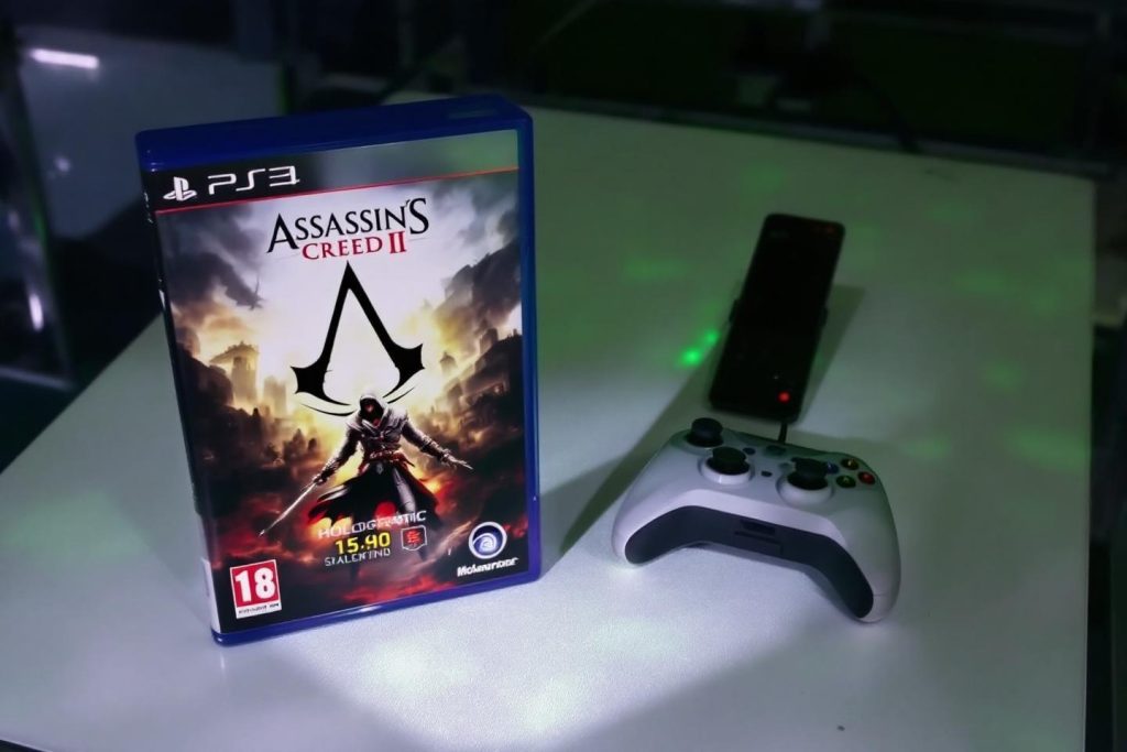 Jeu vidéo Assassin's Creed II avec manette blanche PS3
