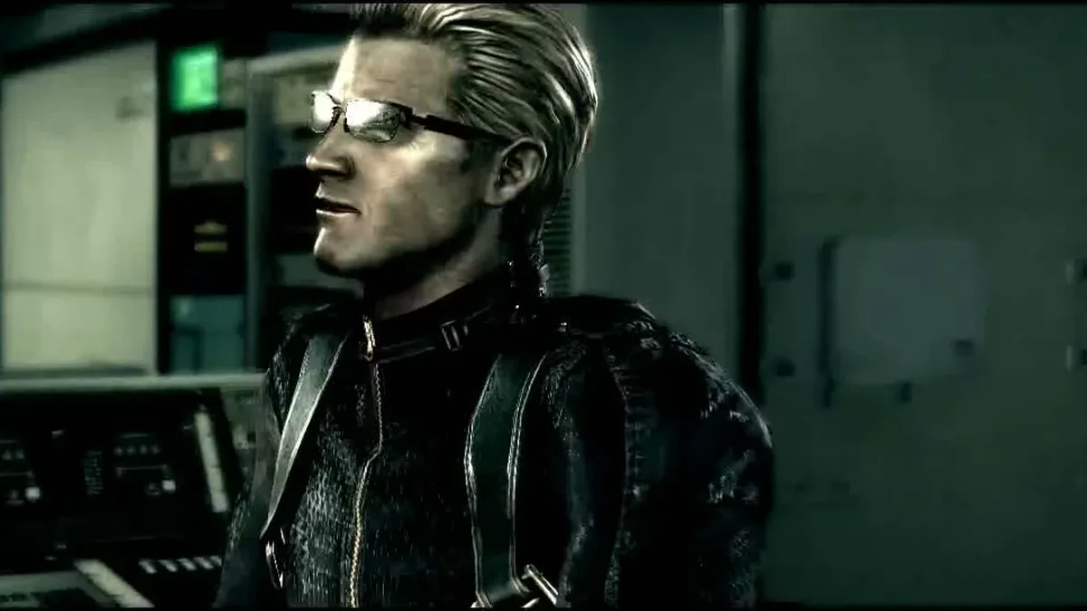 Albert Wesker, blouson noir, lunettes relevées, dans une salle de contrôle de Resident Evil 5