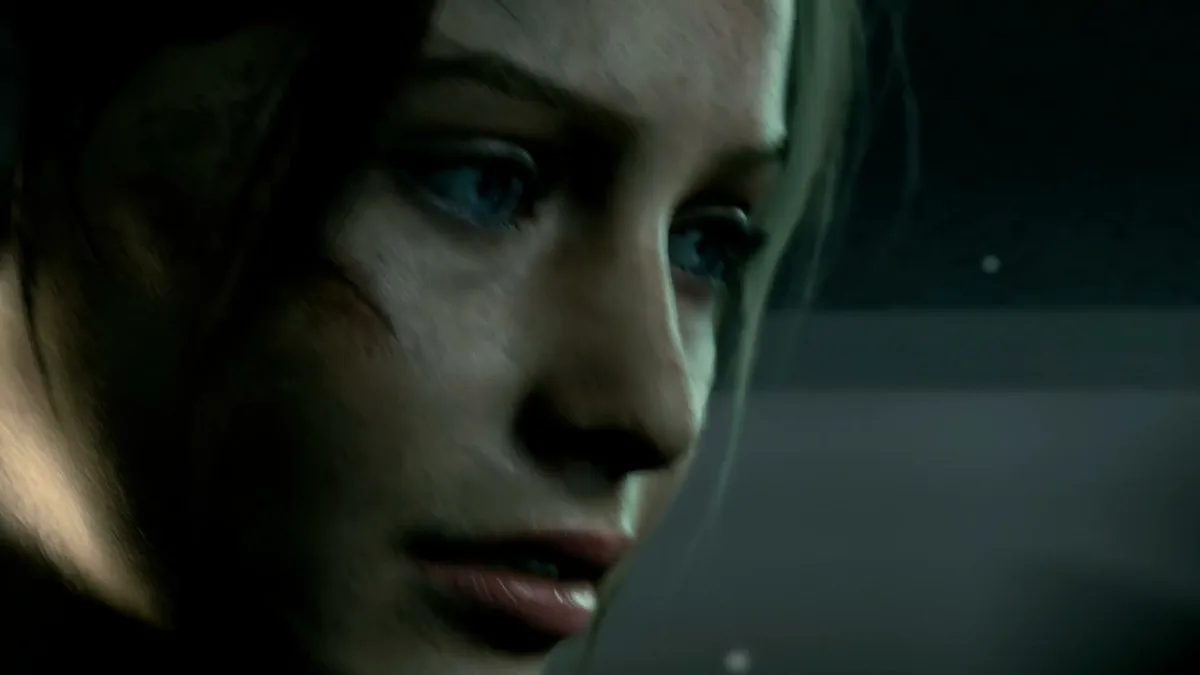 Gros plan sur le visage égratigné de Claire Redfield dans Resident Evil 2 (2019)